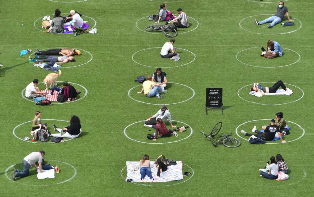 PICTURED people inside the social distancing circles at Domino Park in Williamsburg, Brooklyn NYC.